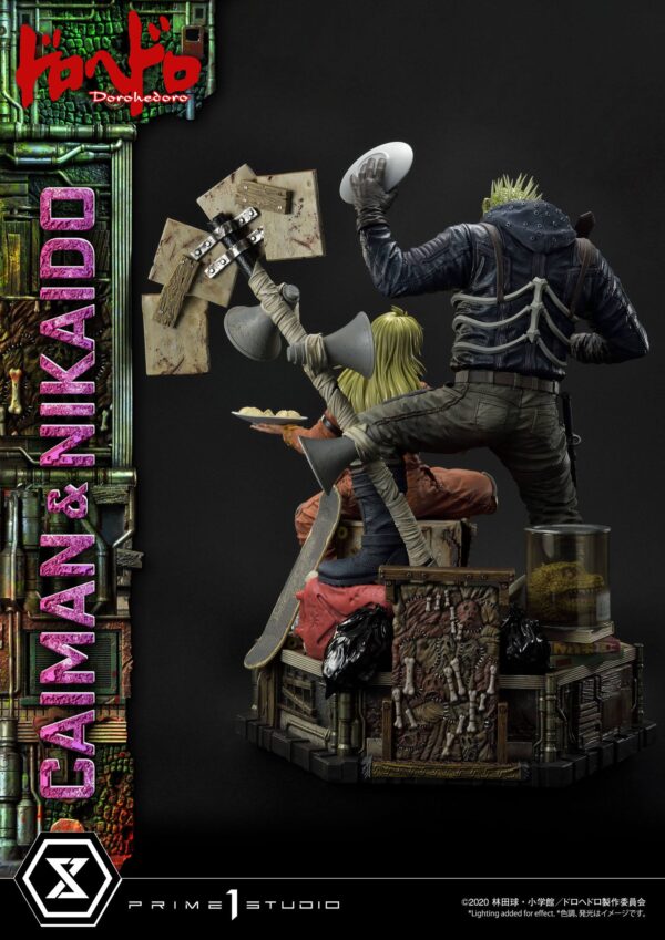 Estatua Caiman y Nikaido Dorohedoro