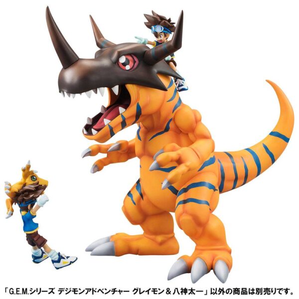 Estatua Digimon Greymon y Taichi